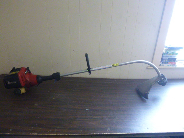 lot 92 image: Homelite Trimlite Weed Whip
