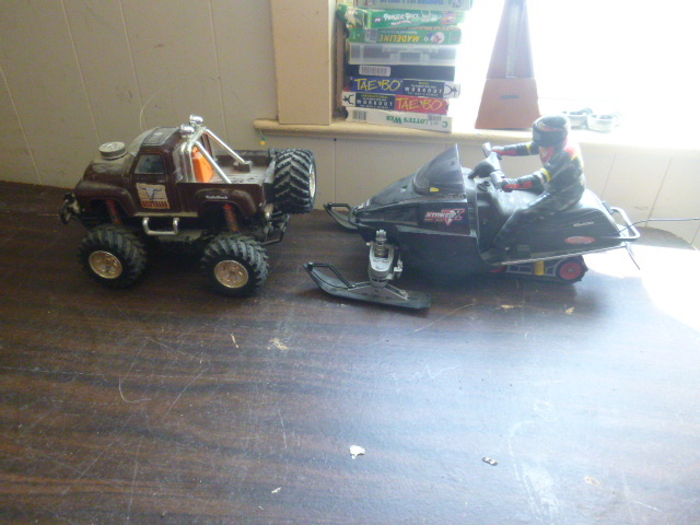 lot 153 image: Remote Control Truck and Snowmobile