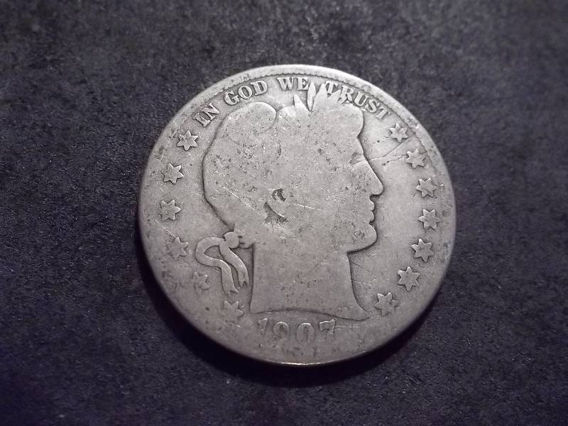 lot 29 image: 1907 O Barber Half Dollar