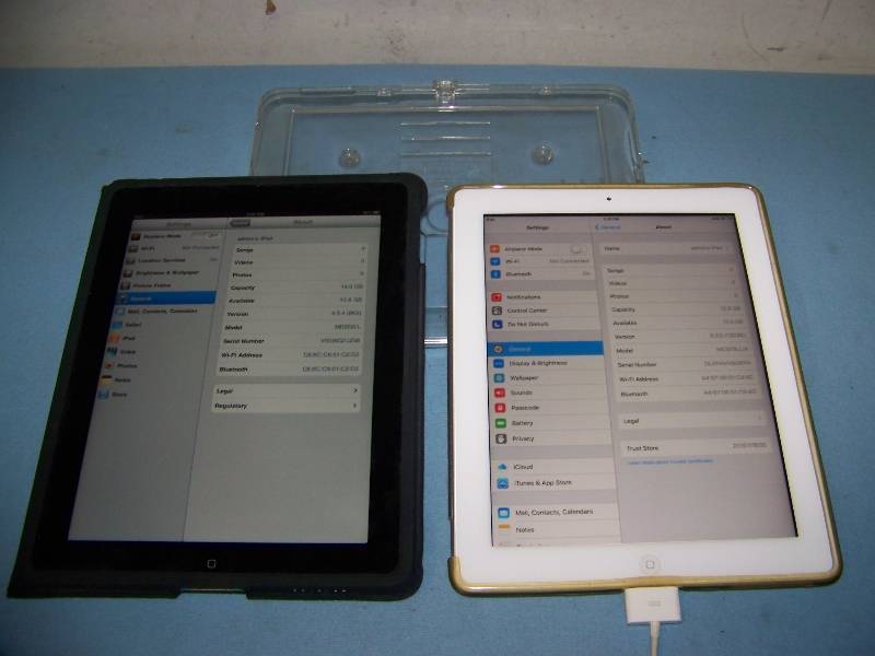 lot 53 image: (2) Apple iPads in Cases and (1) Apple Keyboard