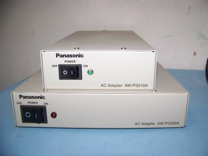 lot 54 image: Panasonic, HD Convertible Camera with Canon Lens, Multi Function Controller, Power Adapters and Indoor Pan  Tilt Head