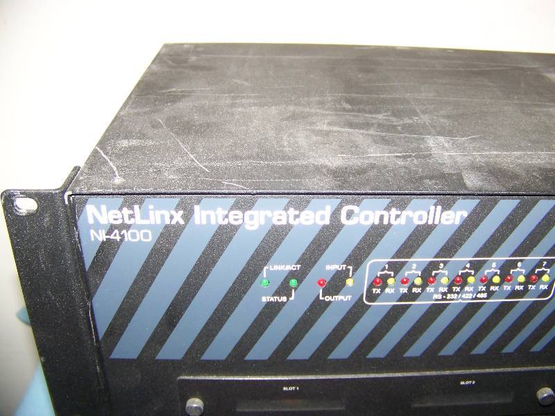 lot 32 image: AMX, Integrated Controllers and Wall Control Plates