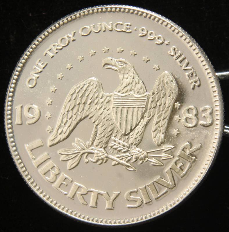 1 TROY OZ. .999 FINE SILVER 1983 A-MARK LIBERTY ROUND