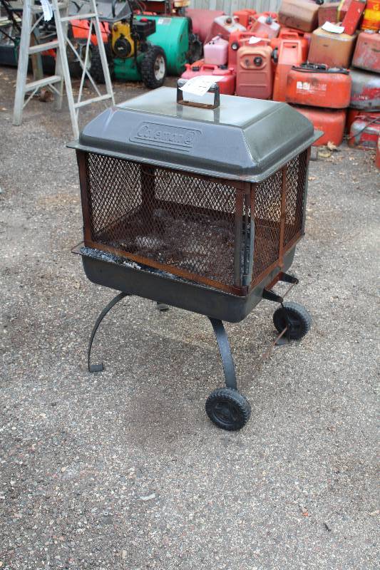 lot 214 image: Coleman Portable Outdoor WoodCoal Buring Heater