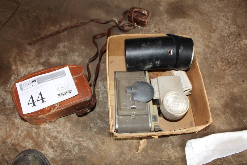 lot 44 image: Polaroid Wink-Light, Sears 202.737040 Macro Lens, Kodak Movie Camera
