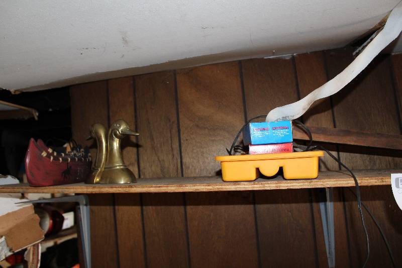 lot 54 image: Duck Bookends, Big Sky Canoes Table Dcor, Nails, Screws, Rivot Tool, And More