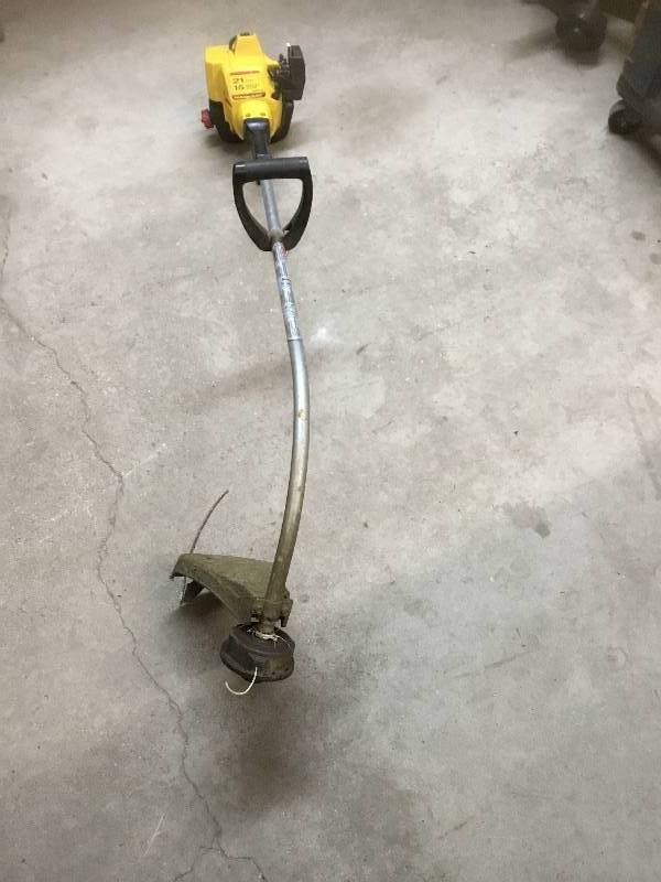 lot 46 image: Yellow Paramount Gas Trimmer - Works