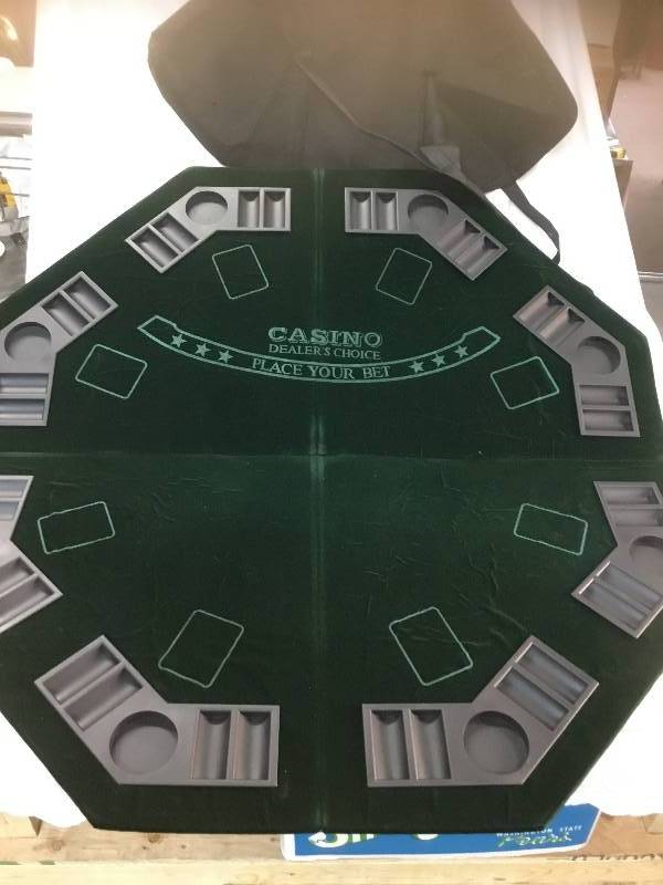 lot 103 image: Portable pokergame table  top 46 across with carry case.