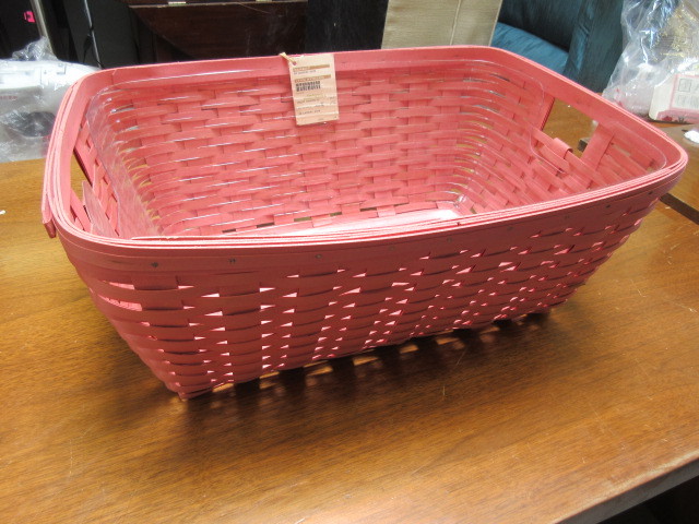 lot 930 image: PINK LAUNDRY BASKET