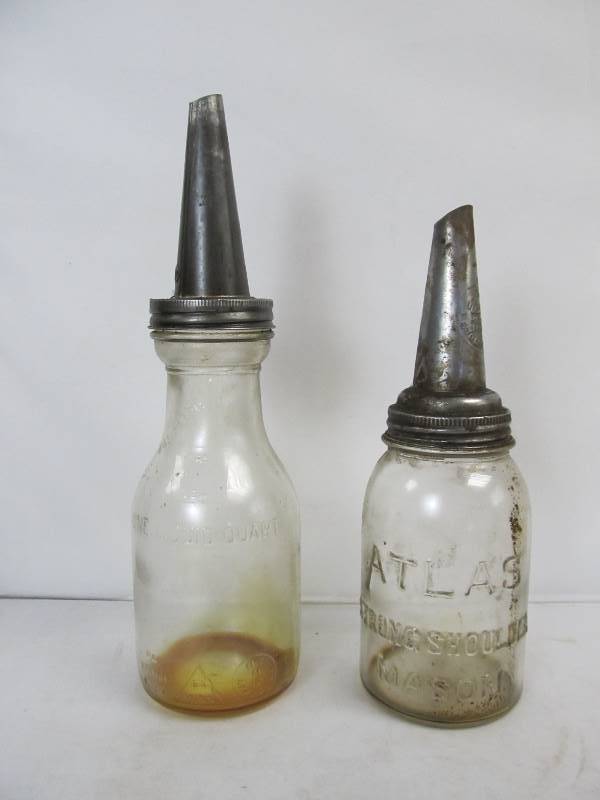lot 120 image: Vintage Glass Motor Oil Bottle wSpouts
