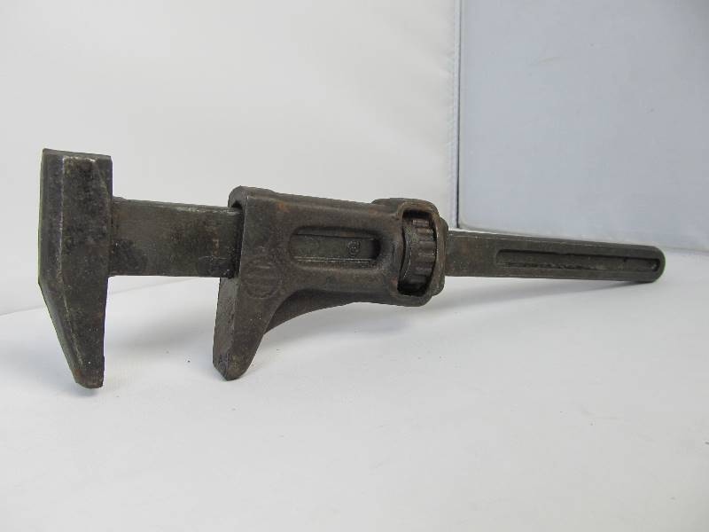 lot 20 image: Antique Cast Iron INTERNATIONAL HARVESTER Adjustable Wrench
