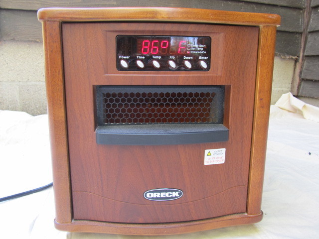lot 195 image: ORECK Heatwise Portable Heater NEW w remote (Model HW1500W)