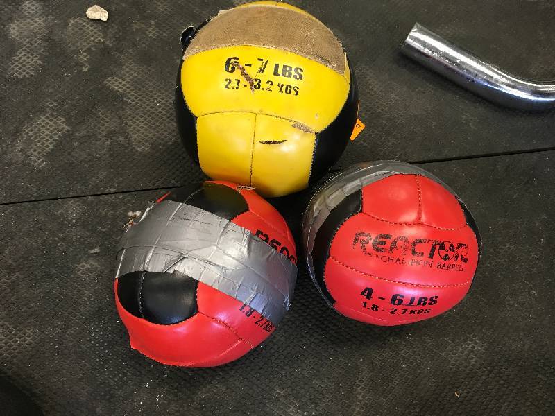 THREE MEDICINE BALLS, ONE 6-7LB AND TWO 4-6LB