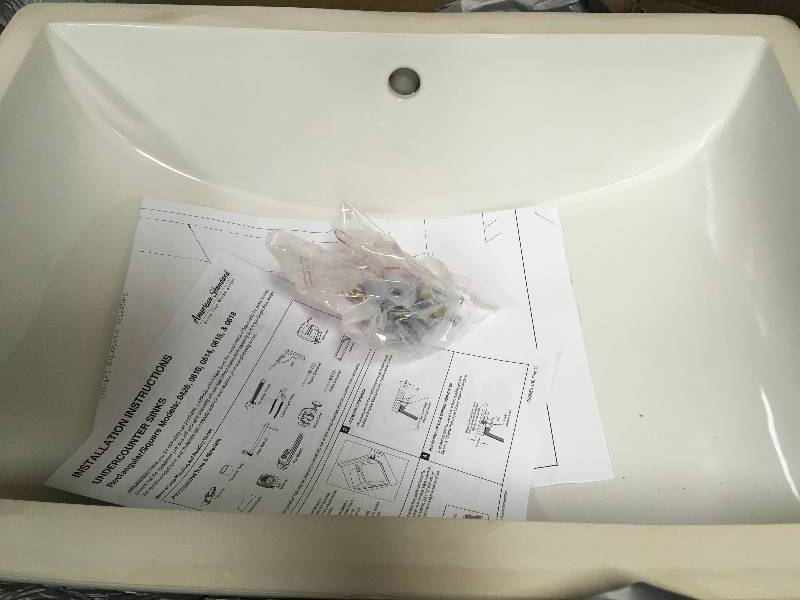 lot 66 image: American Std Studio Rectangular Undermount Bathroom Sink in White not used