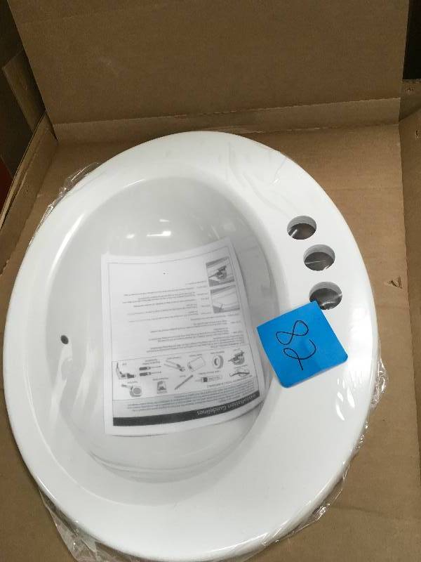 lot 82 image: Bathroom. Tierra Drop-in Bathroom Sink in White 85400 not used