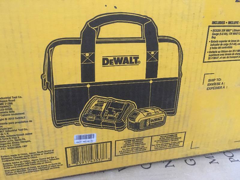 lot 24 image: DEWALT 20-Volt MAX XR Lithium-Ion Starter Kit with Premium Battery Pack 5.0Ah, Charger and Kit Bag NOT USED