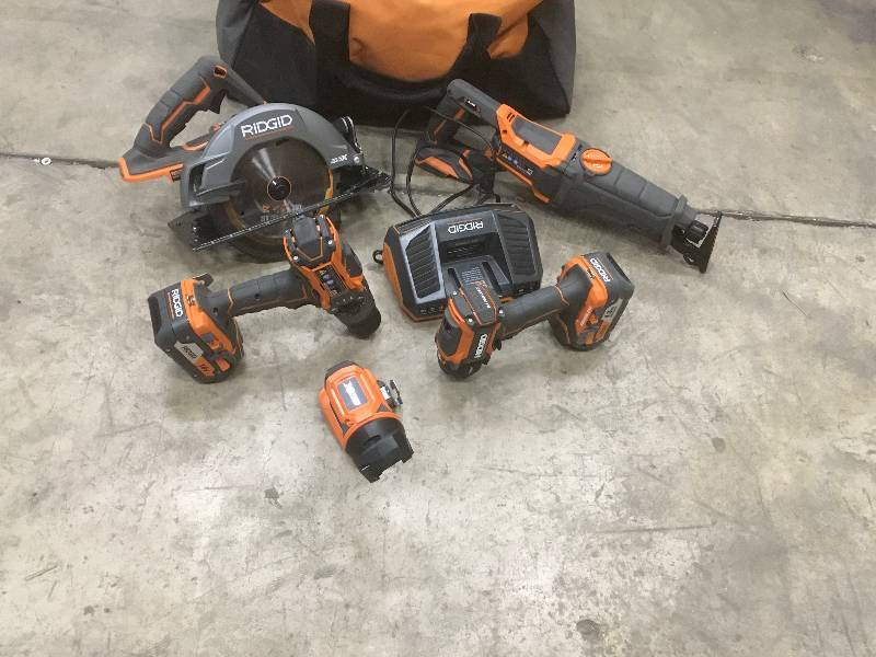lot 31 image: Ridgid 18-Volt GEN5X 5-Piece Brushless Combo Kit with 2 Batteries, Charger and Bag used in working condition
