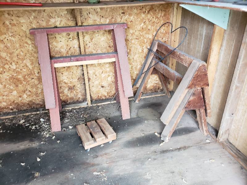 lot 65 image: (4) Saw Horses, Rolling Cart, Lawn Dcor