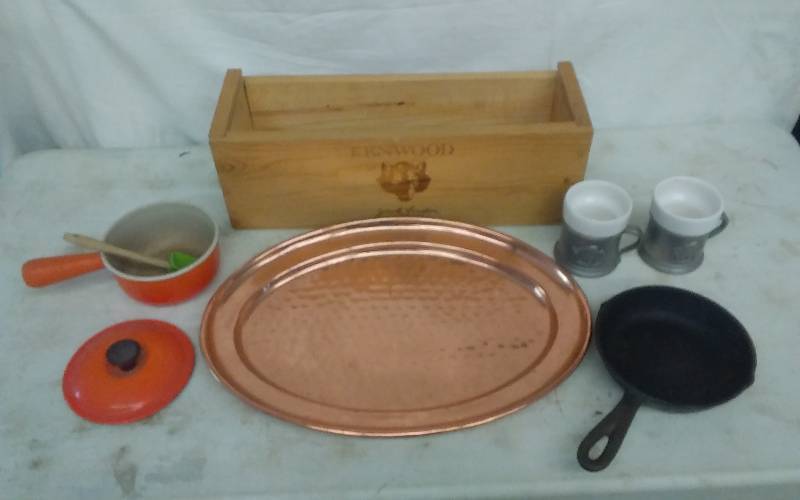lot 25 image: Hammered Copper Colored Tray, Cast Iron Skillet 6-58 No. 3, LeCreuset Pan With Lid, 2-Buffalo Cups & Wood Crate