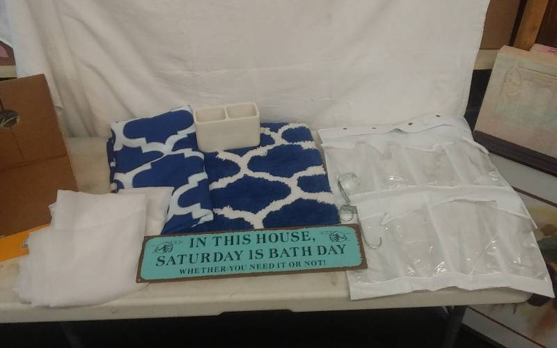 lot 28 image: Blue Shower Curtain & Rug Set, Shoe Pocket Organizer, Sheer Panel, Tin Sign