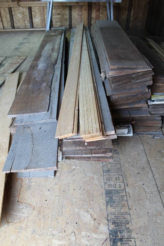 lot 383 image: Lot of (Approximately 45) 10in. Width Wood Siding