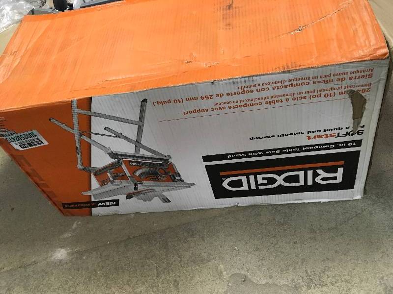 RIDGID 10 in. Compact Table Saw with Folding X-stand in good working conditions Not used