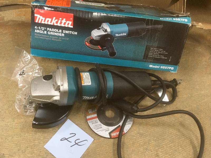 Makita 7.5 Amp 4-12 in. Paddle Switch Angle Grinder used in working condition