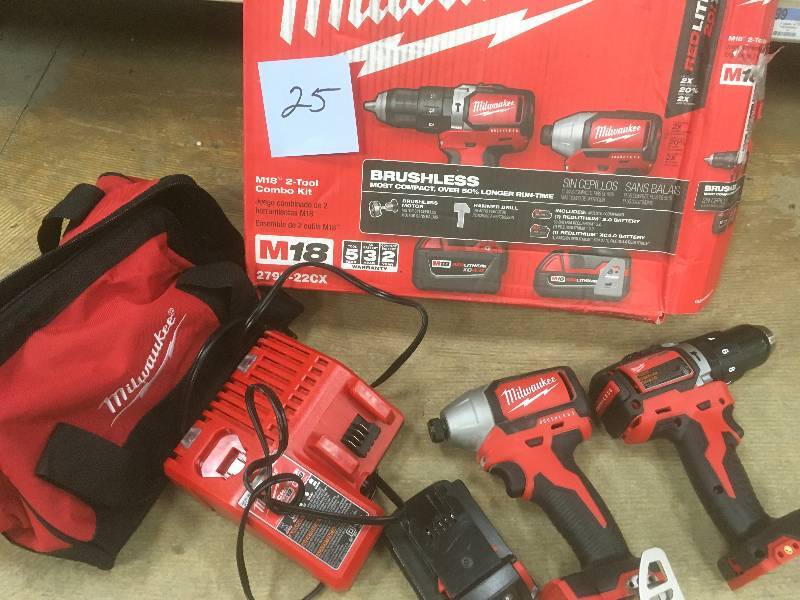 Milwaukee M18 18-Volt Lithium-Ion Brushless Cordless Hammer DrillImpact Combo Kit (2-Tool) W(2) Batteries, Charger, Bag in like new condition