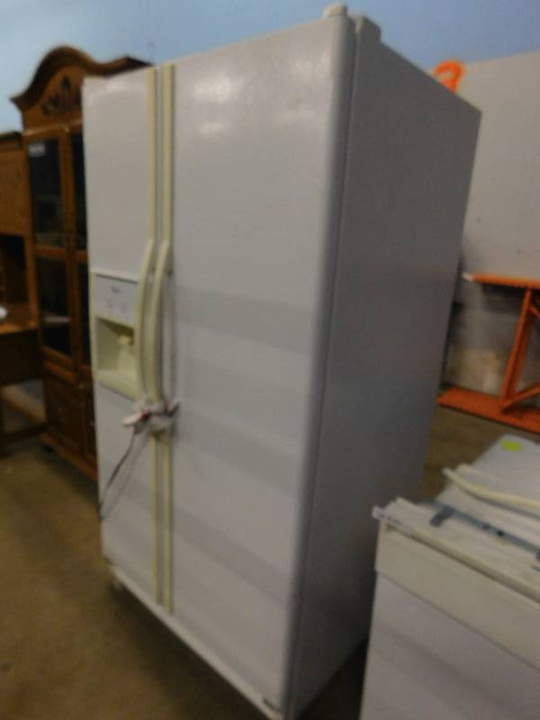 lot 56 image: Whirlpool Side-by-Side Refrigerator