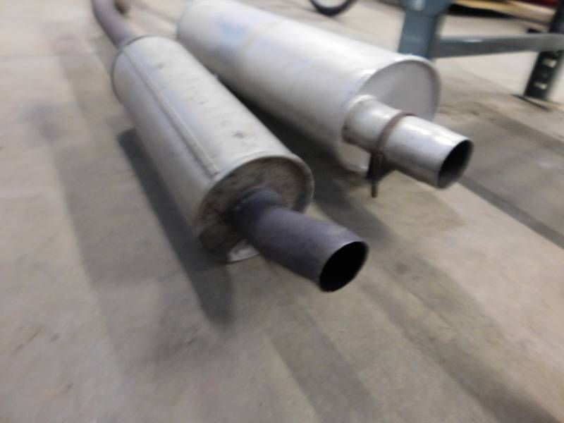 lot 62 image: Two Misc. Exhaust Pipes