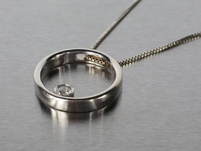 lot 11 image: 12 Carat Diamond Pendant Necklace  14kt White Gold  $2200 Retail