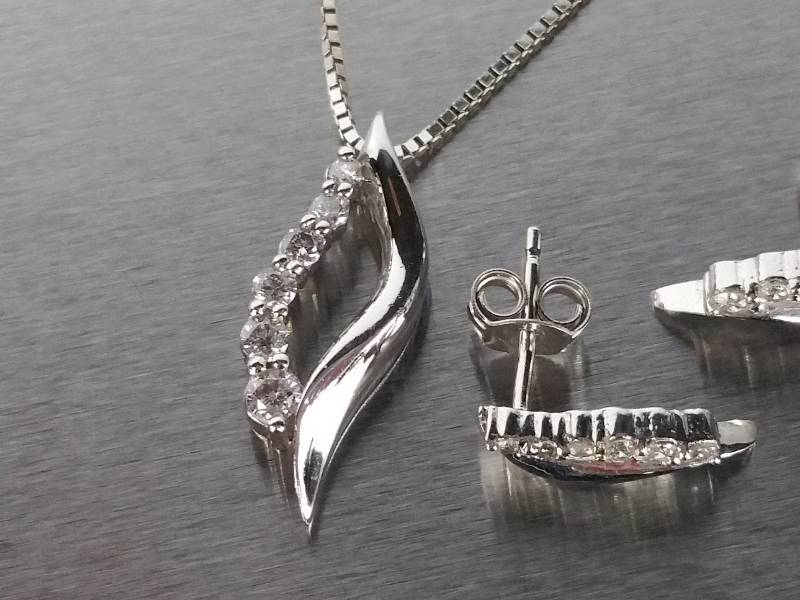 lot 12 image: 14kt Gold Diamond Necklace & Matching 14k Gold Diamond Earrings