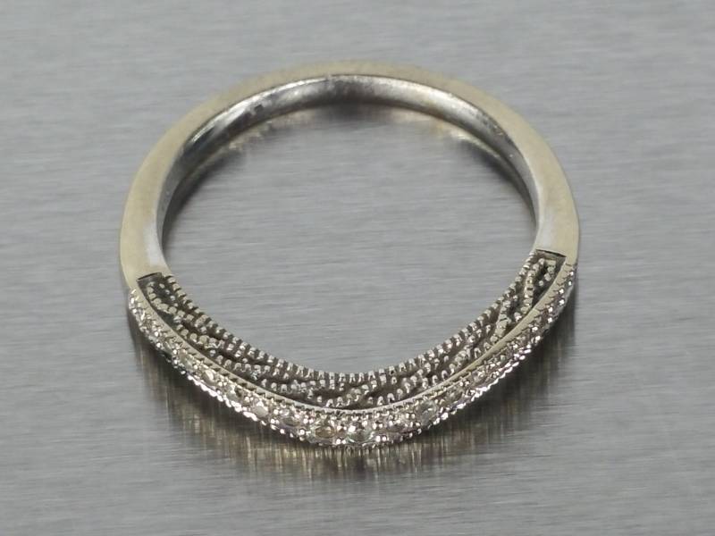 lot 16 image: 12 Carat Diamond Wedding Band  14k White Gold  $1600 Retail