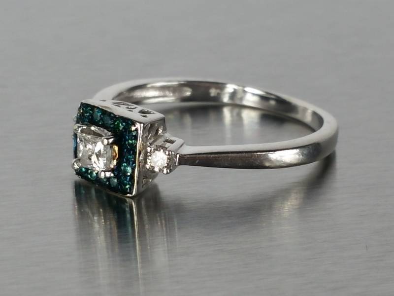 lot 20 image: White and Blue Diamond Ring  10k White Gold  $900 Retail