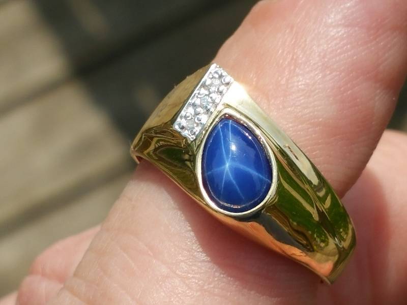 lot 23 image: Star Sapphire and Diamond Ring  14k Yellow Gold  $750 Retail
