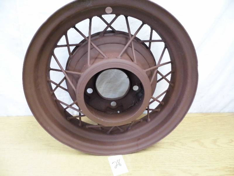 lot 28 image: 18 Antique Tire Rim