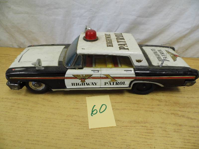 lot 60 image: Highway Patrol Tin Car
