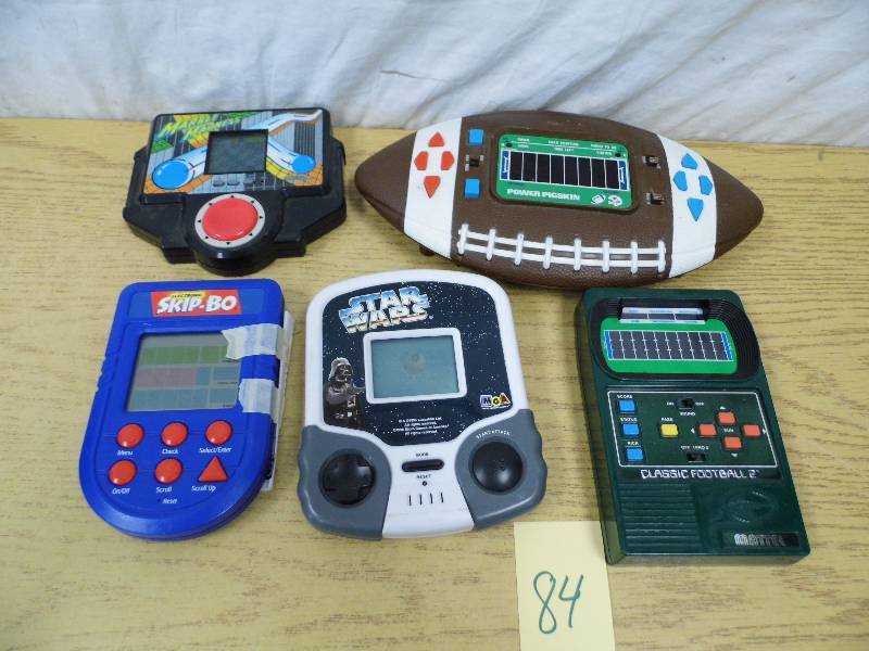 lot 84 image: Hand Held Electronic Games