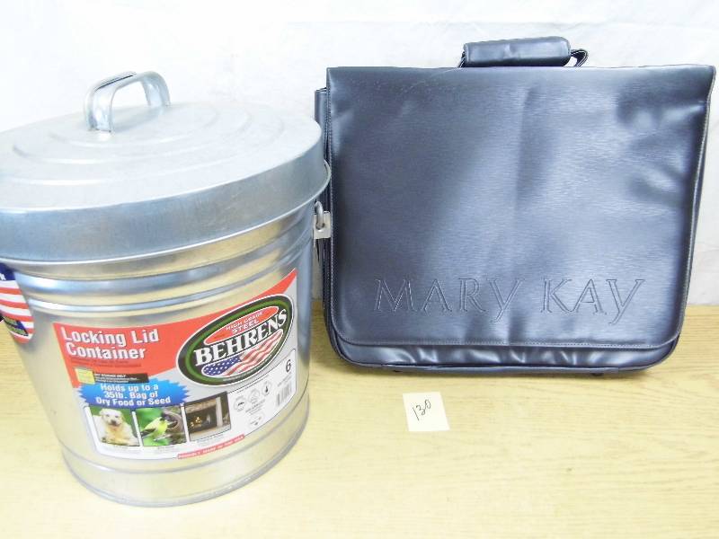 lot 130 image: Can wBird Seed - MaryKay Briefcase