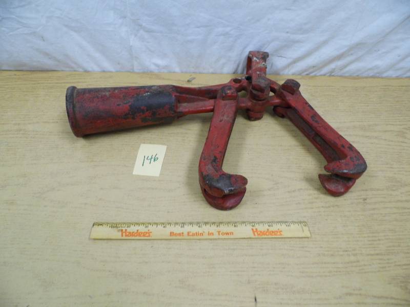 lot 146 image: Red Metal Tool
