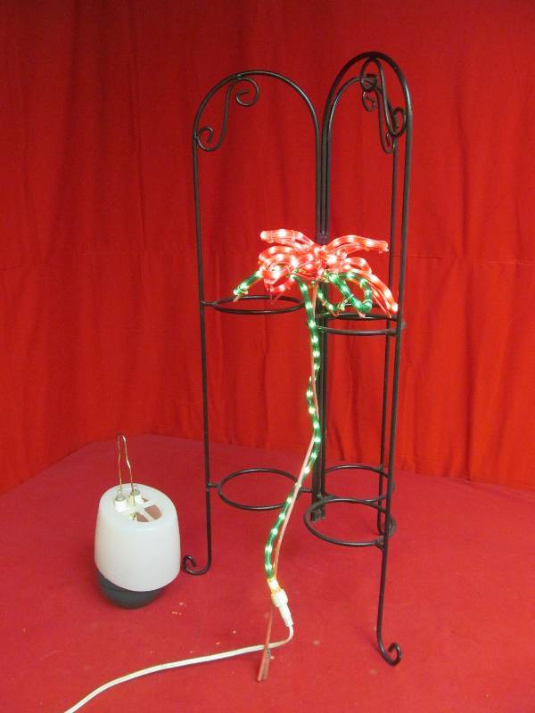 lot 24 image: camp lite, patio lighted dcor, iron plant stand