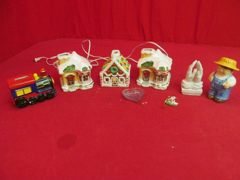 lot 64 image: lighted houses, train coin bank,porcelien farmer