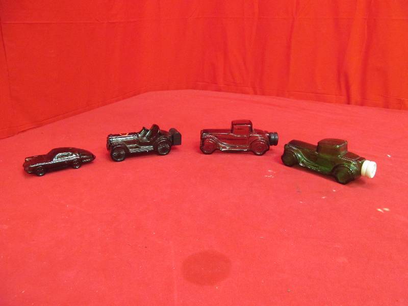 lot 85 image: vintage car Avon decanters