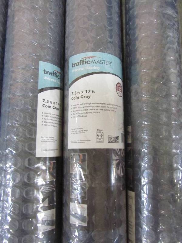 lot 84 image: TrafficMASTER 7.5 ft. x 17 ft. Coin Grey Universal Flooring HK70CN717SGRHD (lot of 3 rolls)