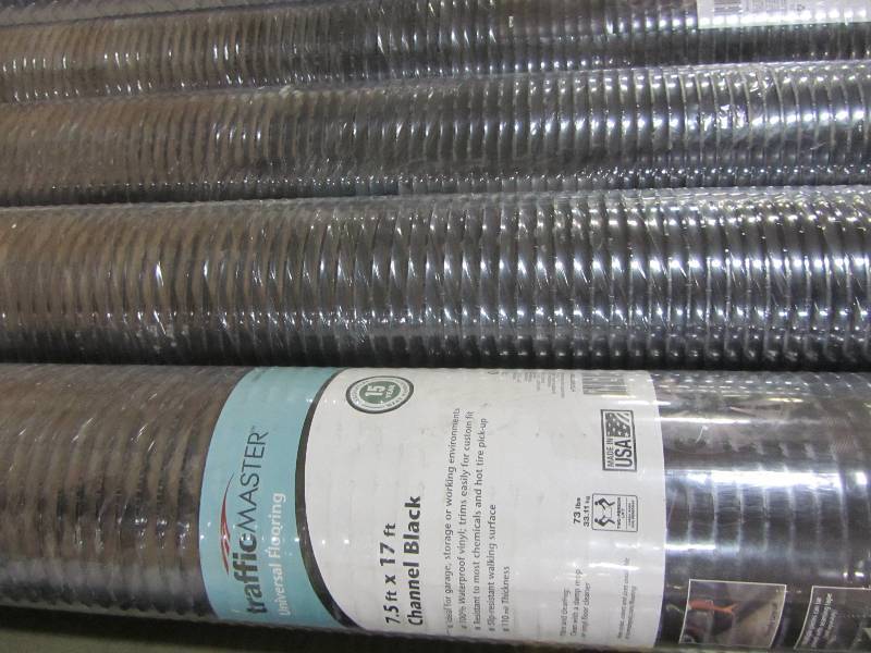 lot 86 image: TrafficMASTER 7.5 ft. x 17 ft. Channel Black Universal Flooring (lot of 4)