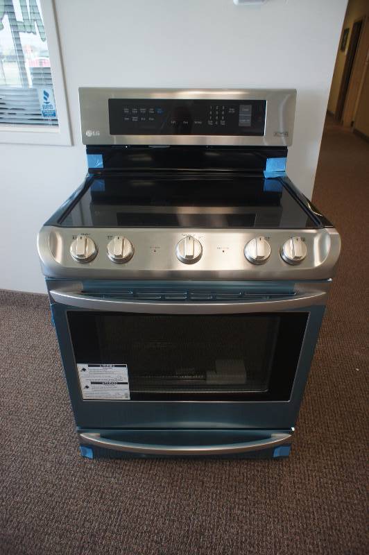 lot 8 image: NEW - SCRATCH AND DENT - LG ENERGY STAR MODEL # (LRE4213ST) - Electric Convection Range - Freestanding - 6.3 cu ft - Stainless Steel  - TESTED WORKS - MSRP $ 1599.99
