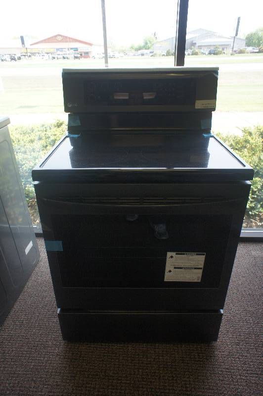 lot 9 image: NEW - SCRATCH AND DENT - LG ENERGY STAR MODEL # (LRE319BM) - LG Electronics 6.3 cu. ft. Electric Range with Convection Oven in Matte Black Stainless Steel - TESTED WORKS - MSRP $ 1199.99