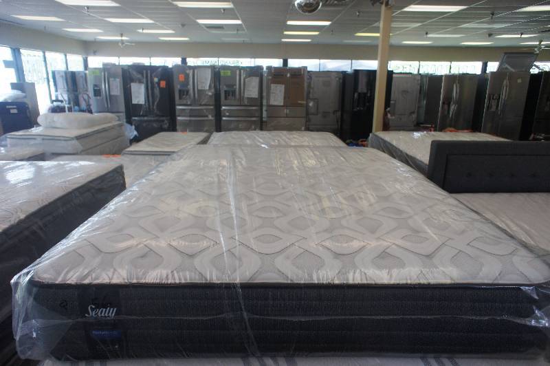 lot 20 image: NEW - QUEEN SIZE - SEALY POSTUREPEDIC - PERFORMANCE - HUMBOLT FIRM TIGHT - QUEEN SIZE MATTRESS MSRP $1799.99