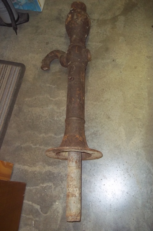 lot 37 image: Vintage well case pump top