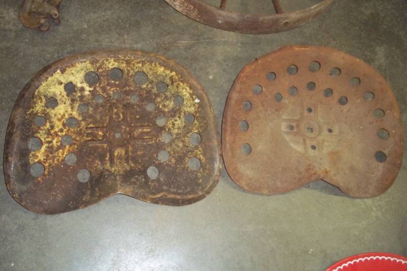 lot 60 image: 2 vintage tractor seats